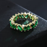 Baguette Cut Uneven Ring with Green Stones