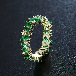 Baguette Cut Uneven Ring with Green Stones